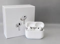 AirPods 2nd Generation floating on black background
