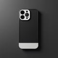 iPhone 14 Pro Max black and white case flat lay on dark grey background - top view