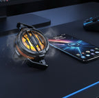 CX07 magnetic cooling fan glowing amber on dark gaming desk next to smartphone - dramatic lifestyle shot